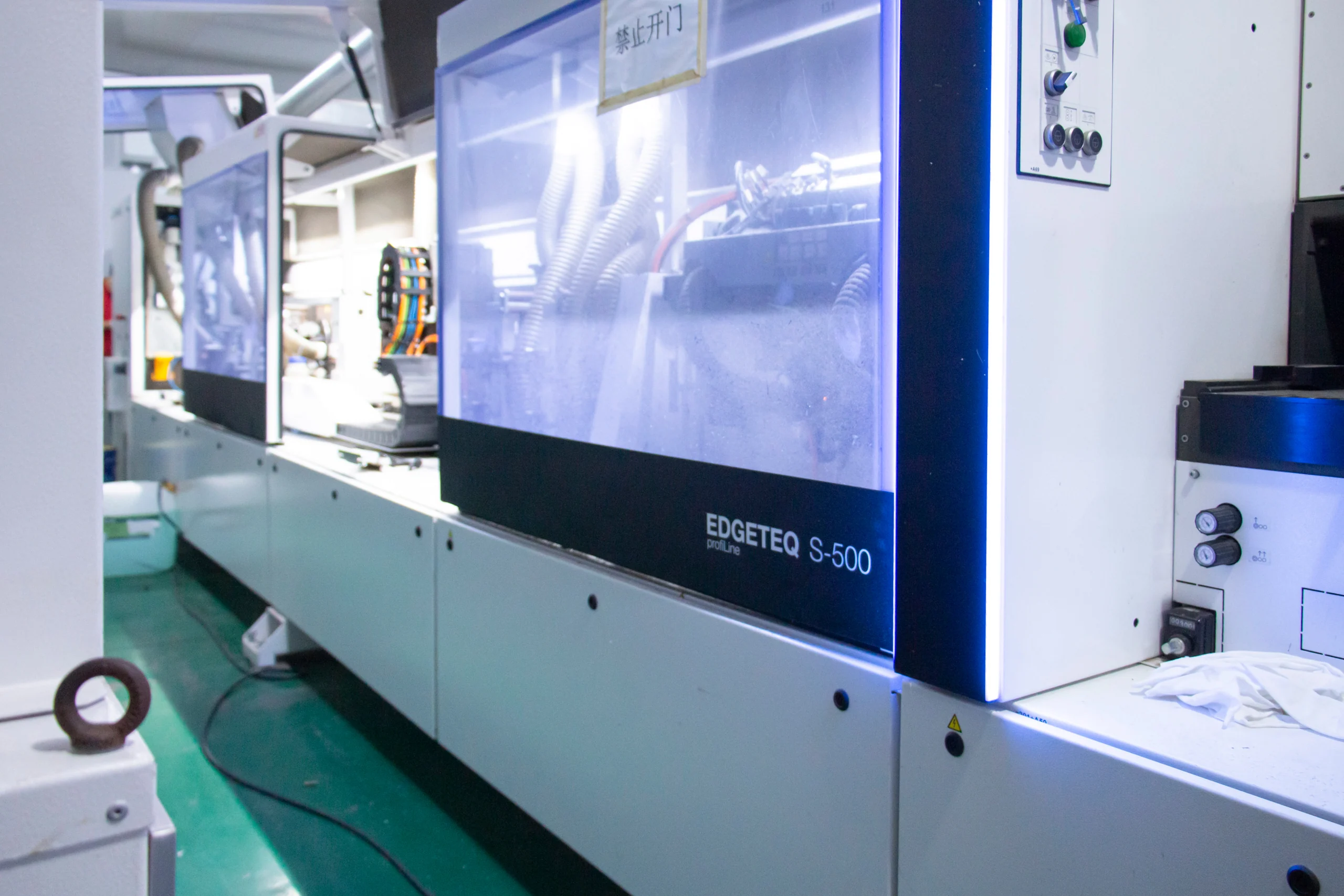 Edge-finishing equipment at the Foshan workshop